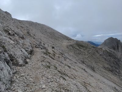 A photo of a bare mountainous landscape illustrating the upper parts of the trail